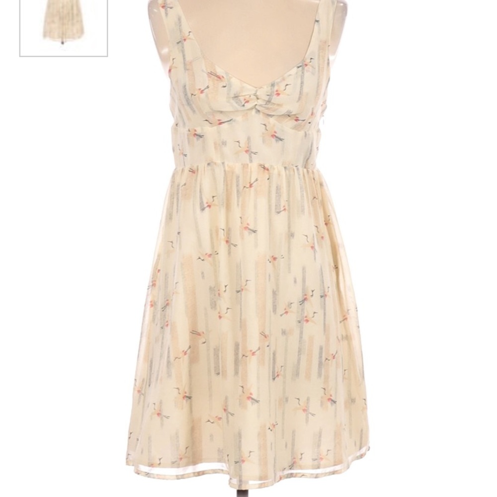 Bird patterned open back dress